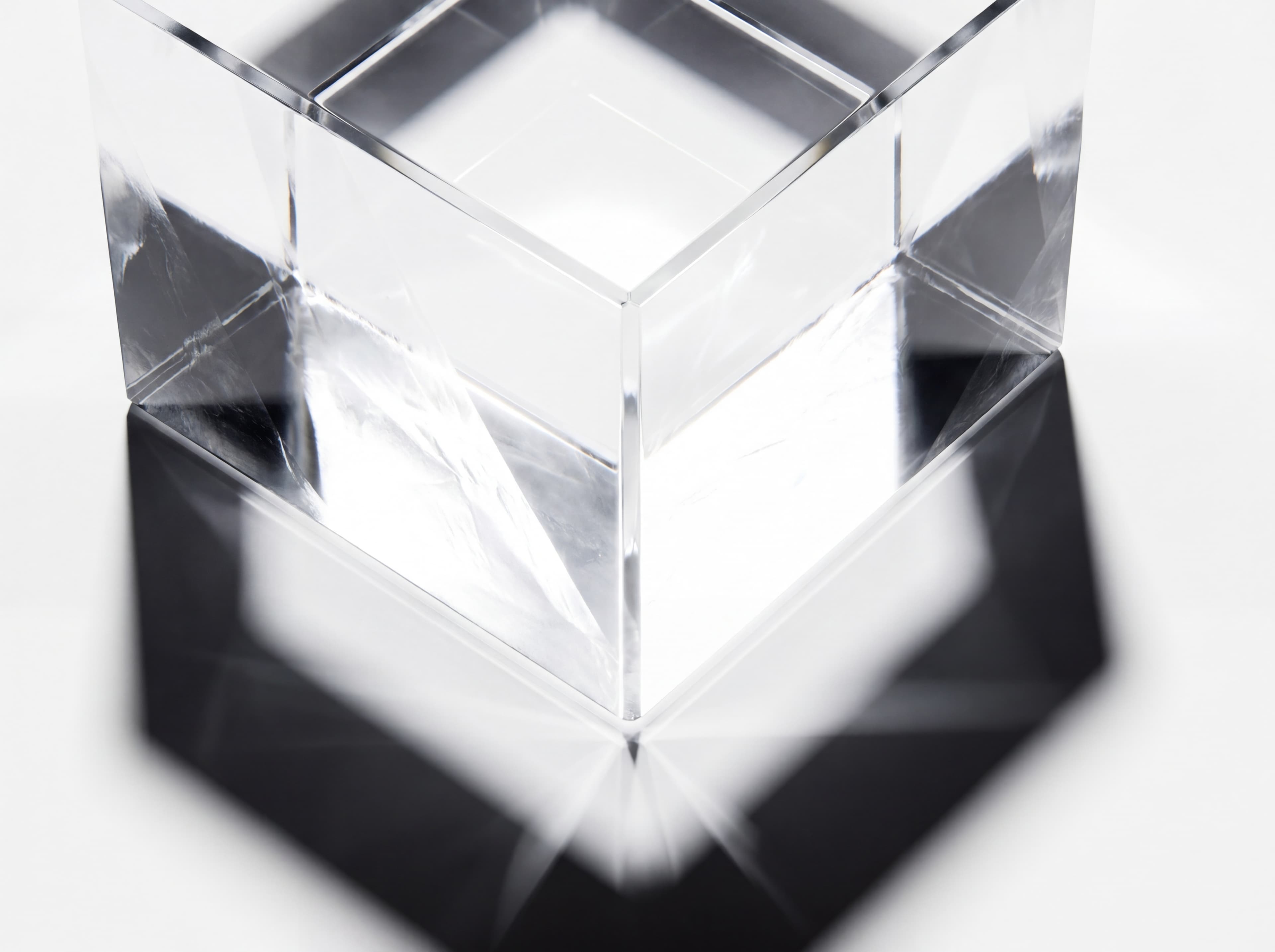 Crystalline cube with prismatic light refraction